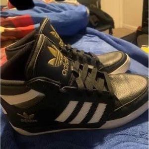 Gold and black adidas